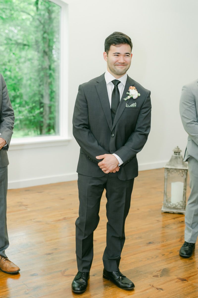 groom seeing bride walk down the aisle