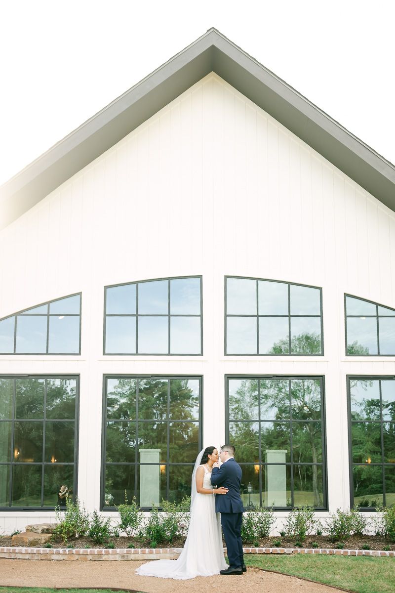 bride and groom at The Blue Magnolia wedding venue