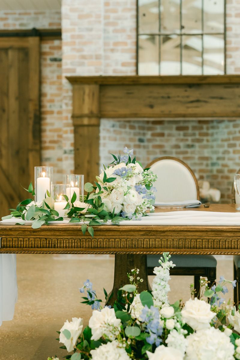 wedding reception flowers with greenery