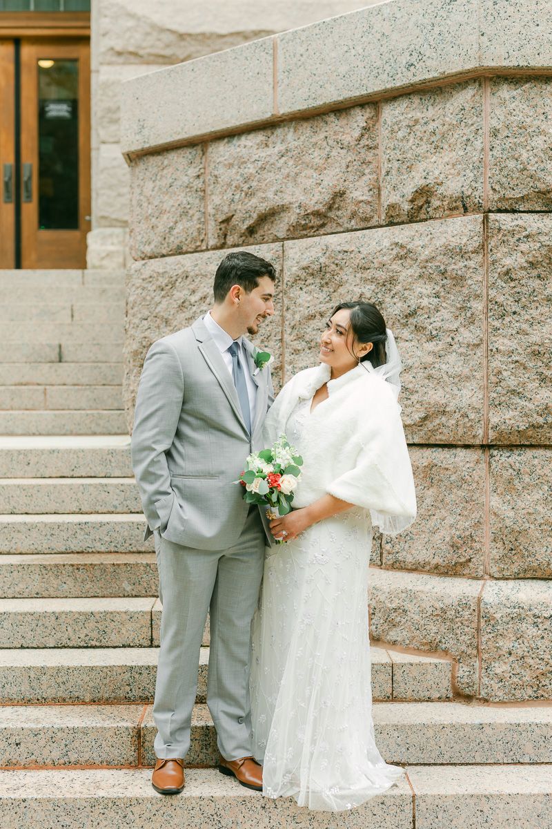 couple after their winter wedding in Downtown Houston