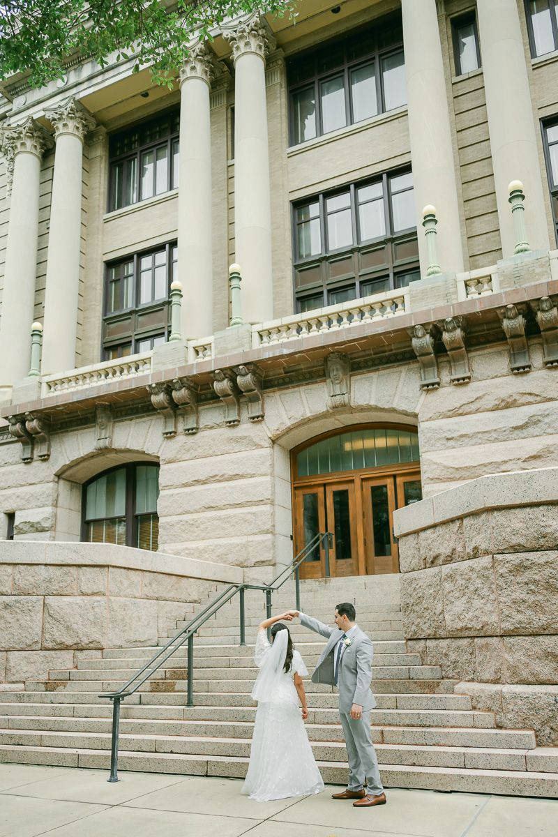 couple dancing after their winter wedding in Downtown Houston