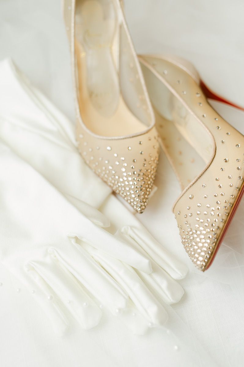 gold wedding shoes and white gloves