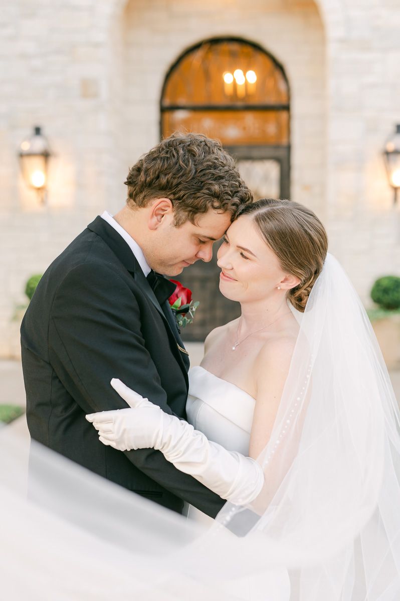 bride and groom at black tie wedding at Briscoe Manor