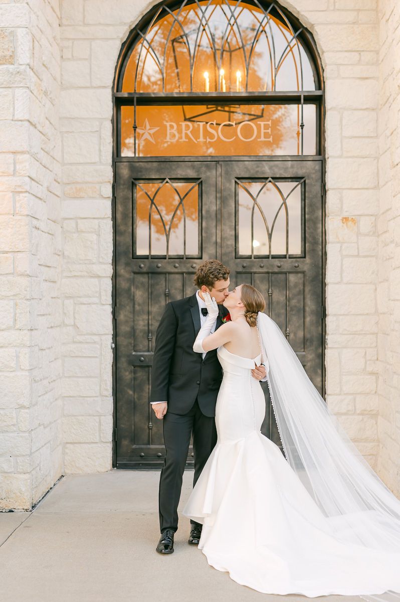 bride and groom at black tie wedding at Briscoe Manor