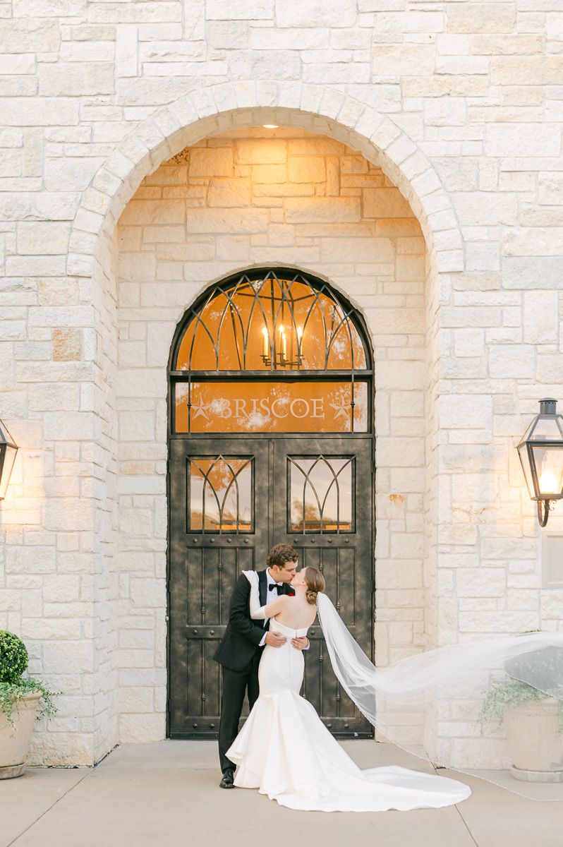 bride and groom at black tie wedding at Briscoe Manor
