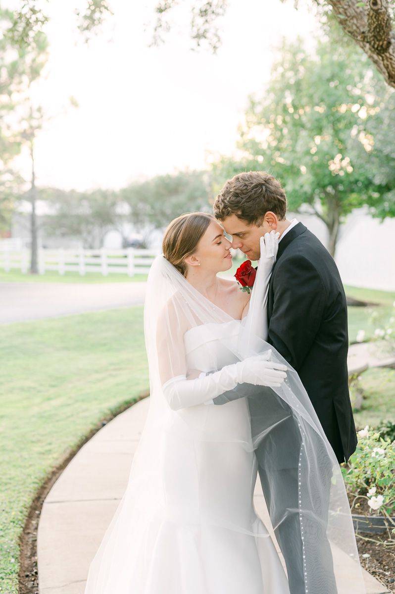 bride and groom at black tie wedding at Briscoe Manor