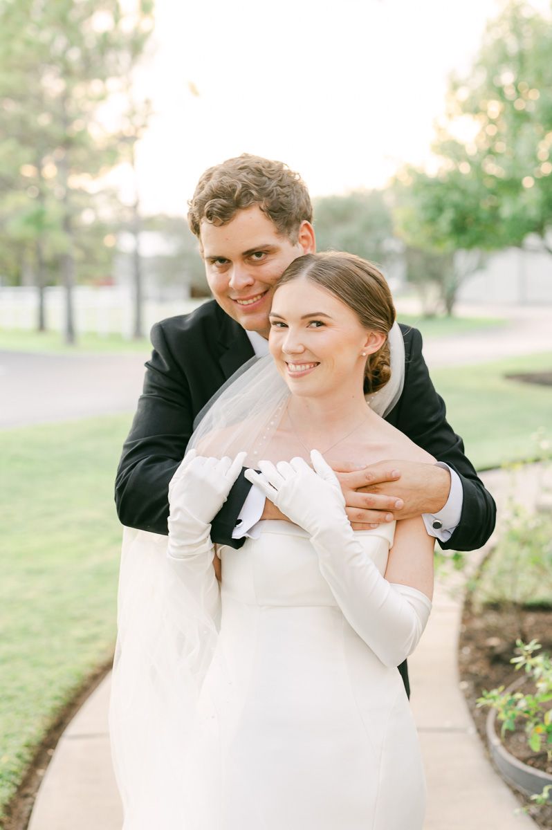 bride and groom at black tie wedding at Briscoe Manor