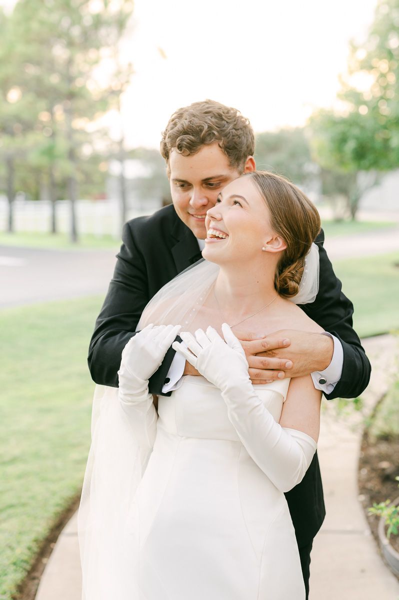 bride and groom at black tie wedding at Briscoe Manor