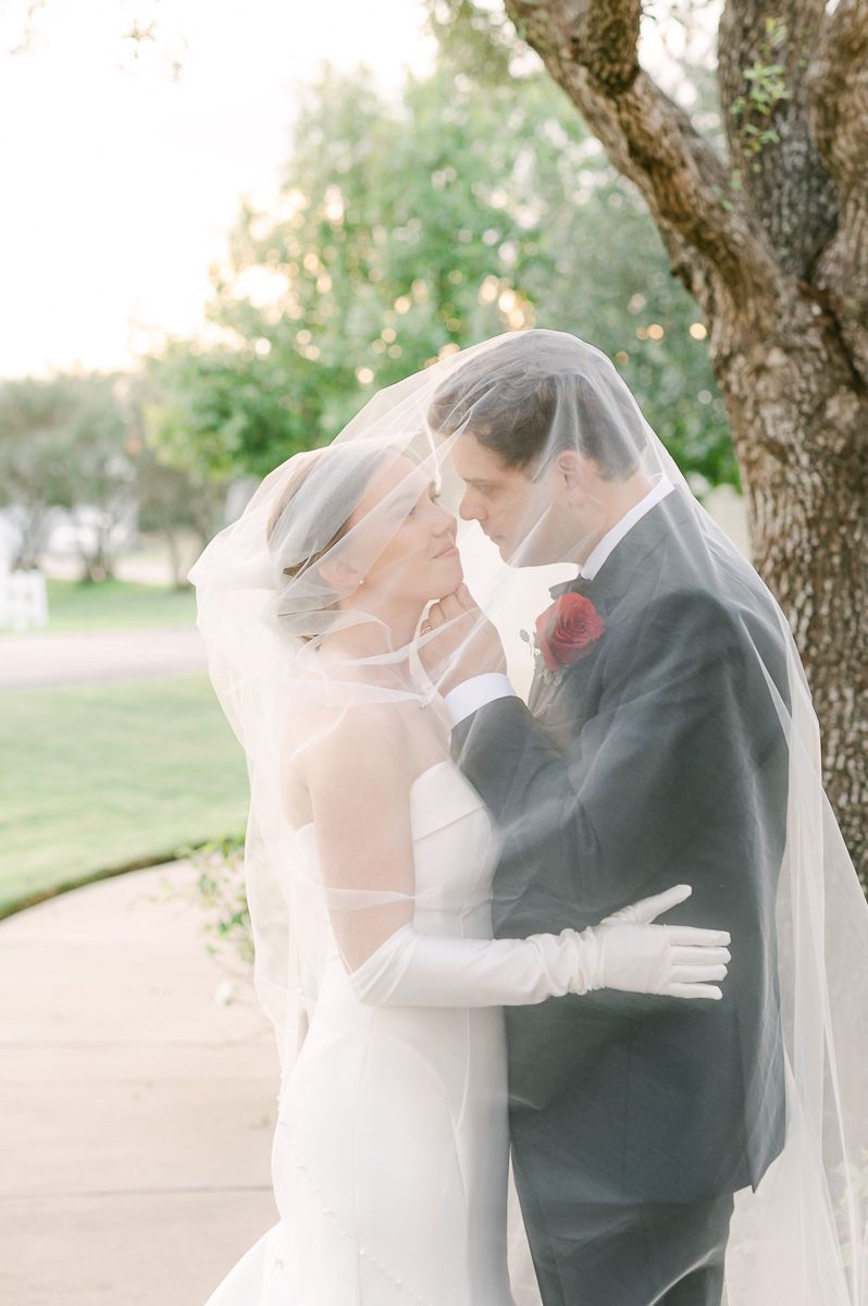 bride and groom at black tie wedding at Briscoe Manor