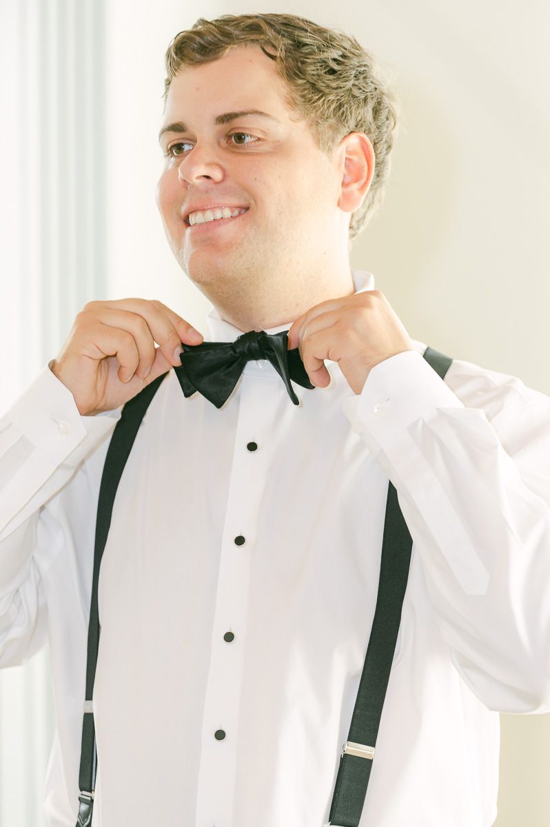 groom getting ready at Briscoe Manor