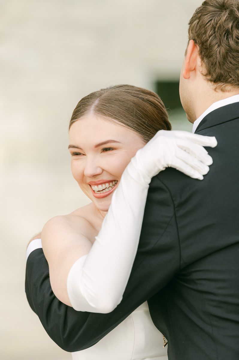couple sharing first look at black tie wedding at Briscoe Manor