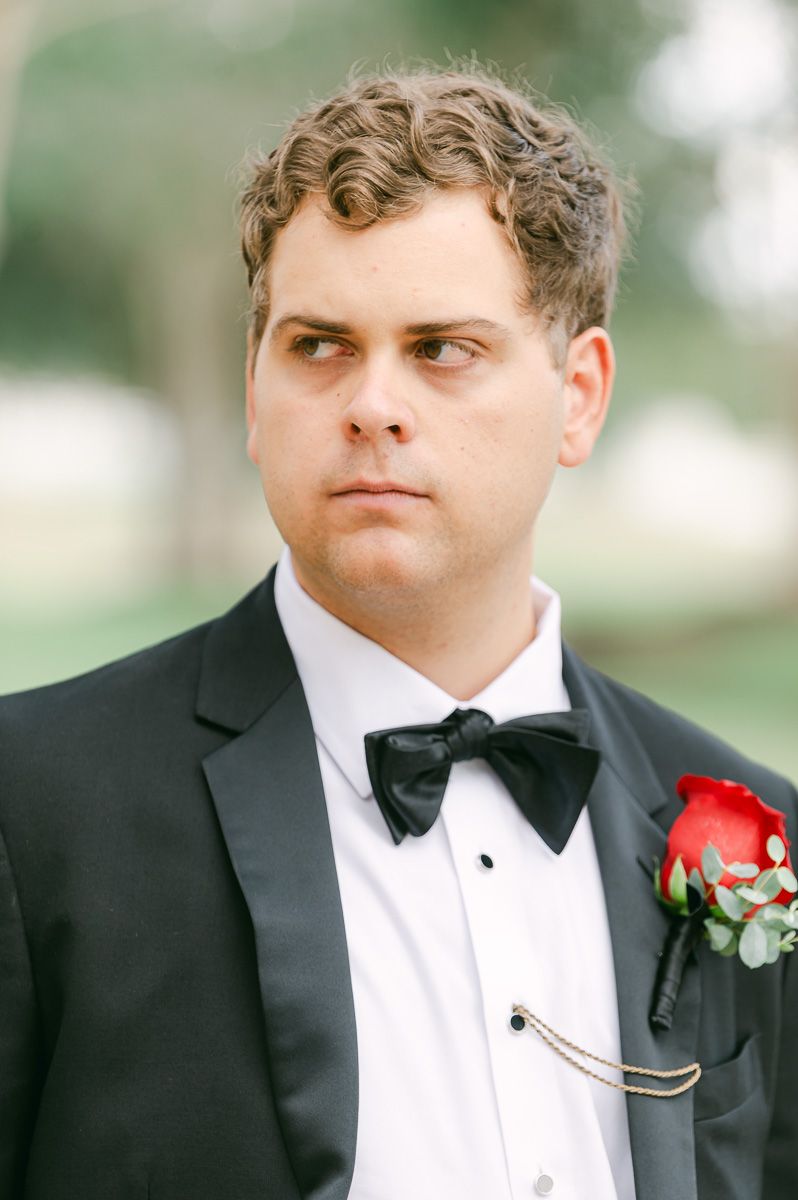 groom in black suit and bow tie in Richmond, Tx