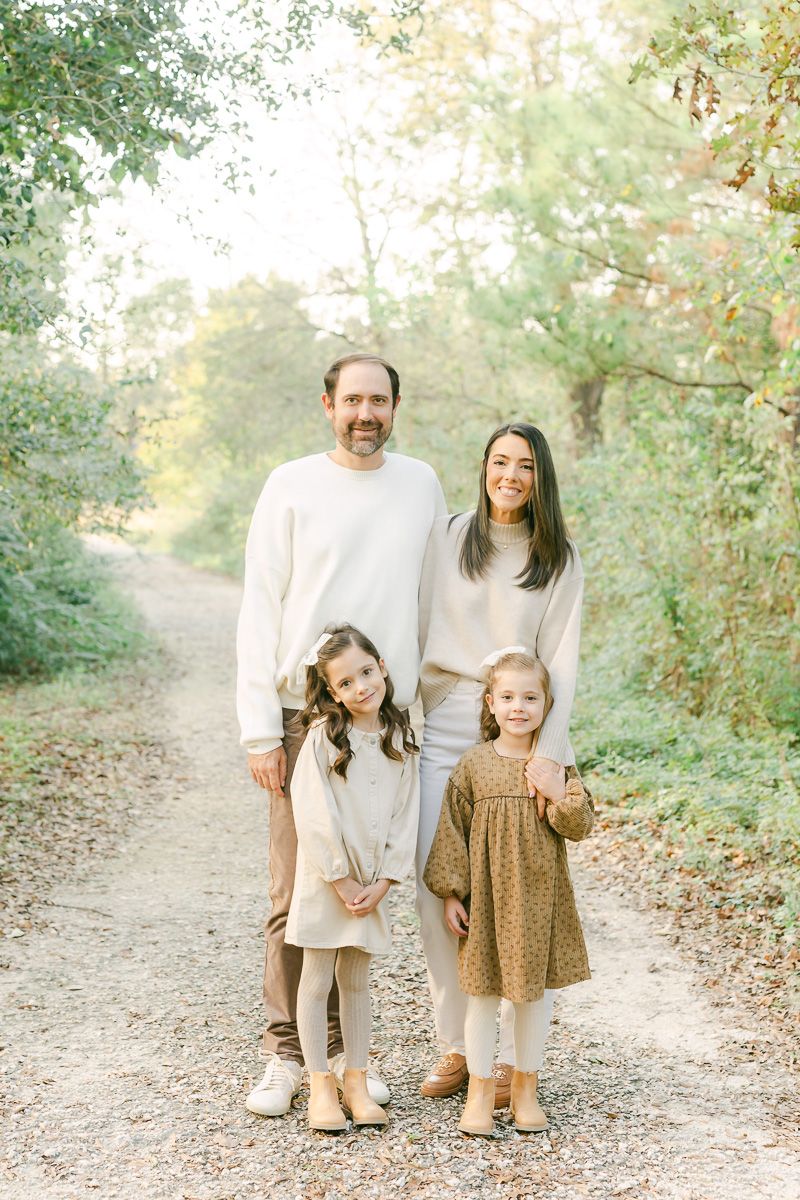 a family taking family photos at Memorial Park