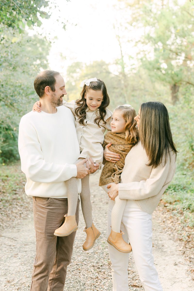 a family taking family photos at Memorial Park
