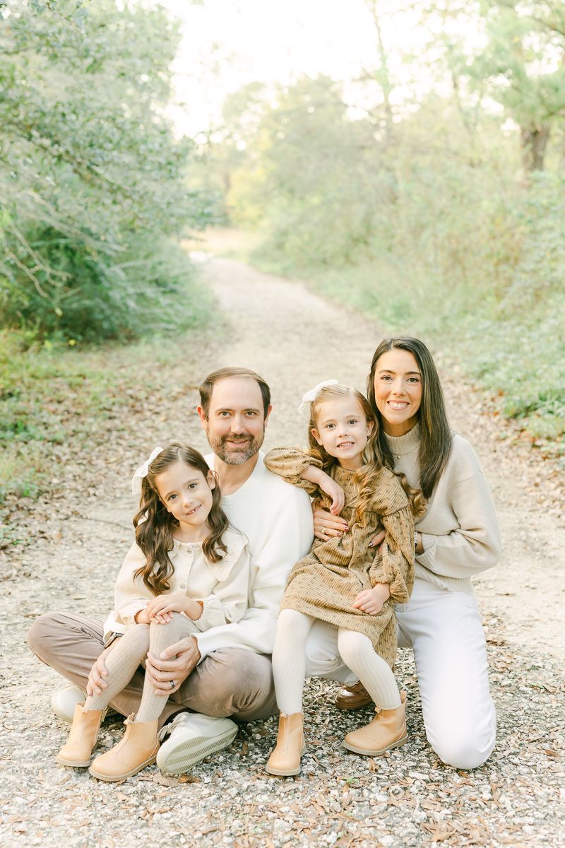 a family taking family photos at Memorial Park