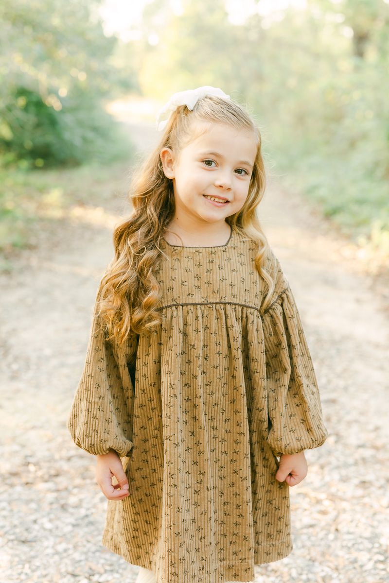children posing for Houston family photographer