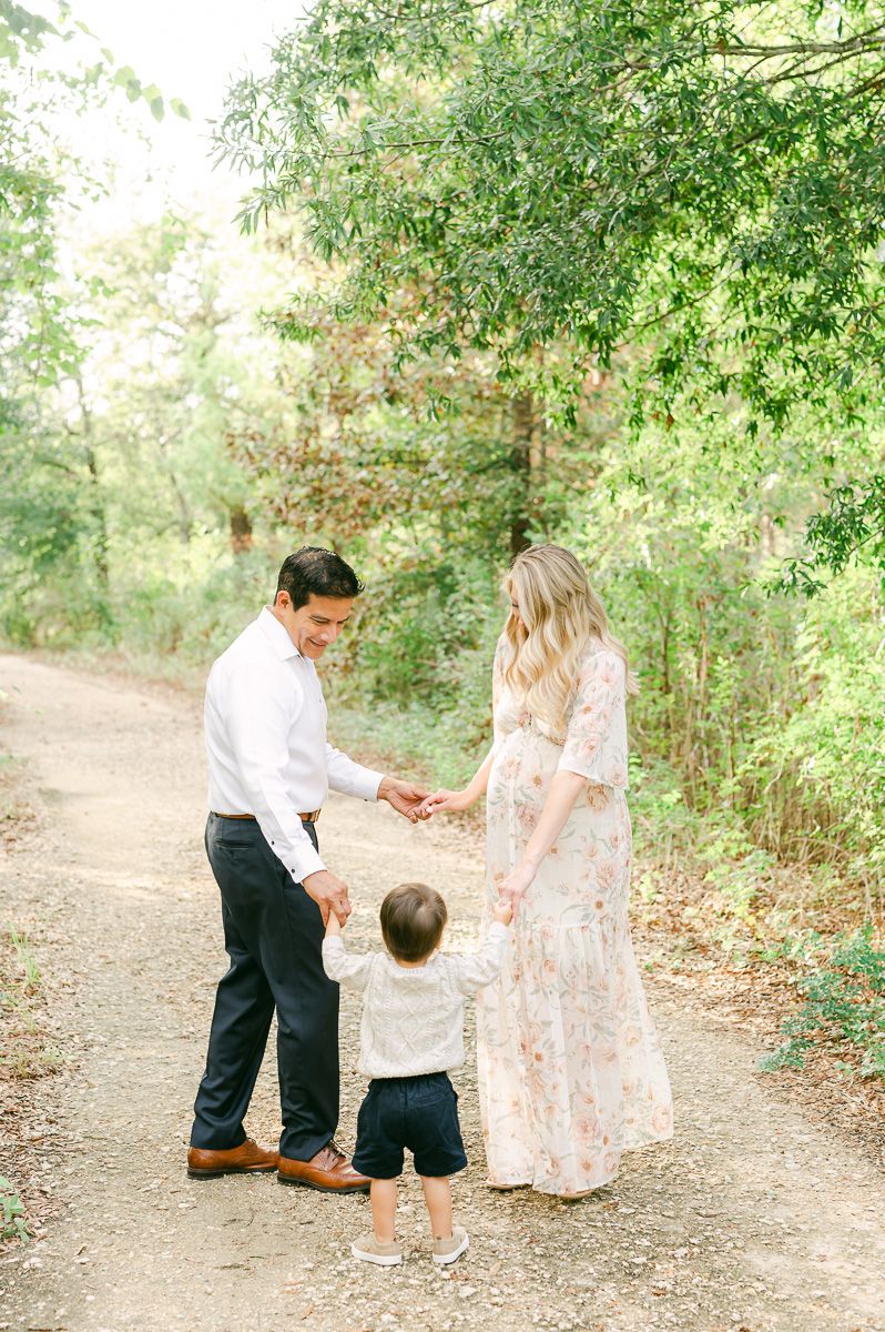 family spinning during mini session in Houston