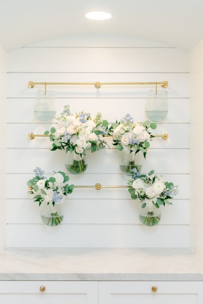 bridal bouquets handing on a wall