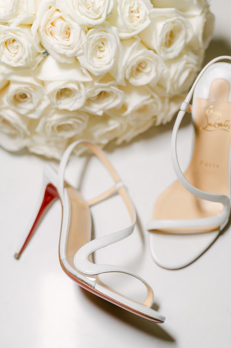 bridal shoes with white flowers