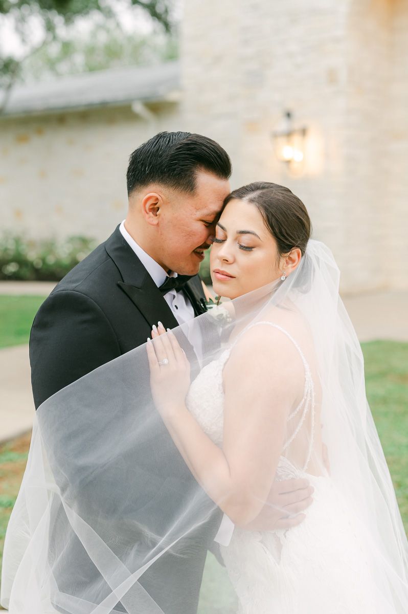 bride and groom at their fall wedding at Briscoe Manor